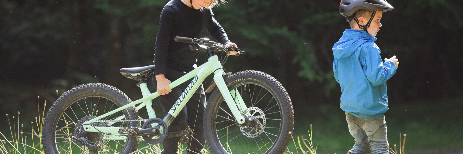 image of two kids' and a bike