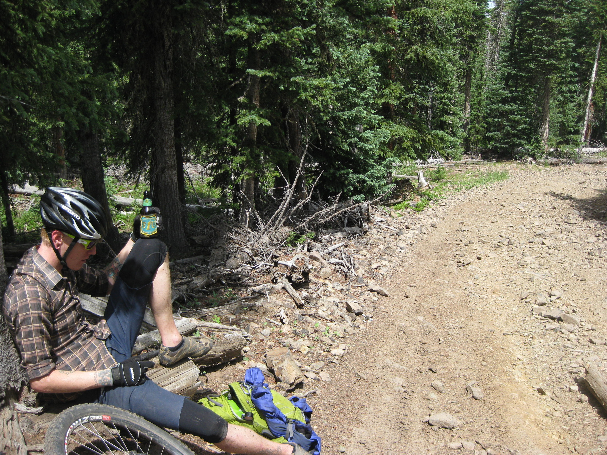 This person is drinking away the regret he feels about coming on this ride.