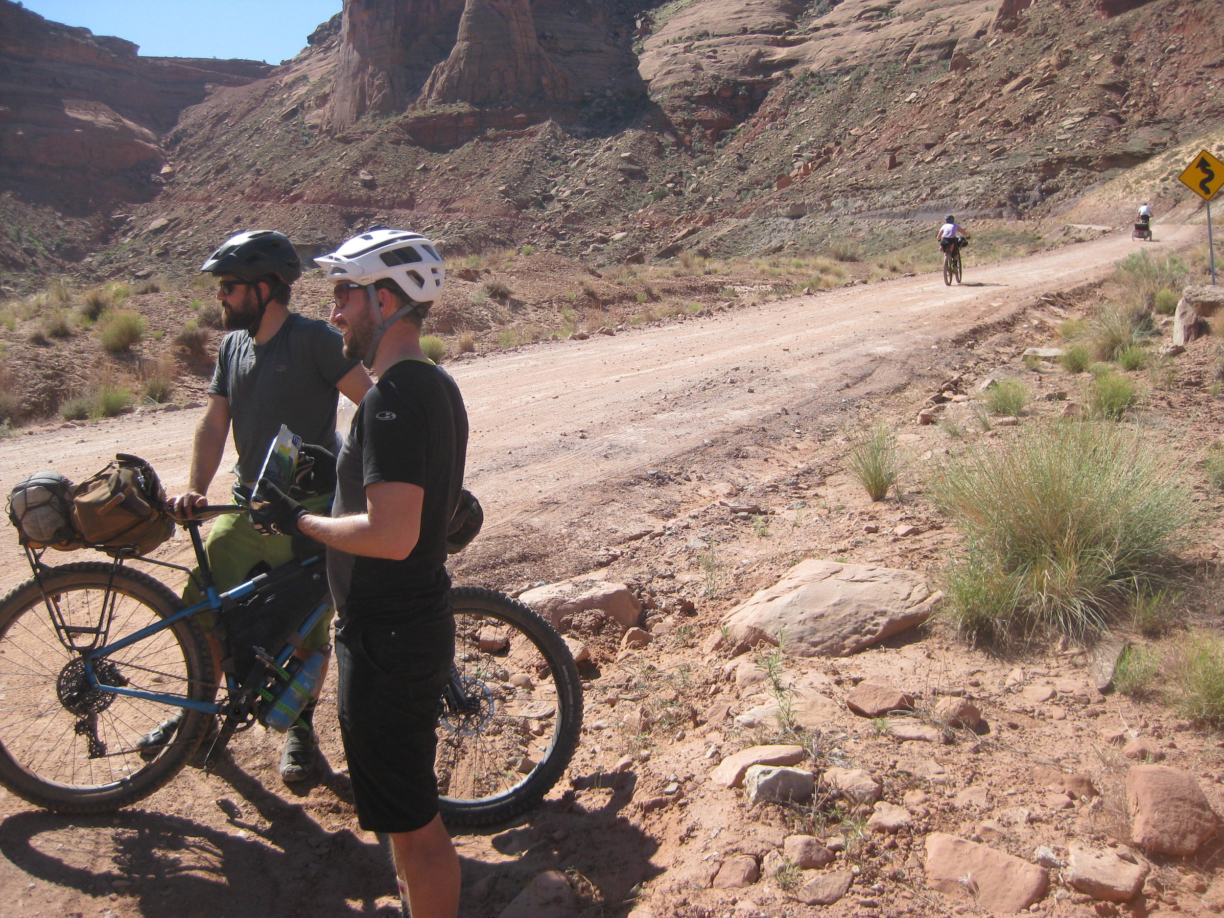 Note the local dude ahead of Sarah pulling a kid in a trailer up this hill, which is steeper than it looks.